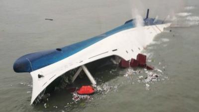 South Korean ferry "Sewol" is seen sinking in the sea off Jindo April 16, 2014