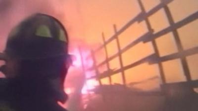 Fire scene captured on firefighter helmet camera