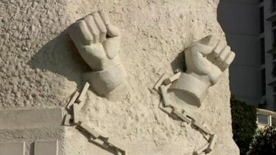 A monument depicting hand-cuffs in Algiers