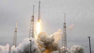 A rocket carrying the SpaceX Dragon ship lifts off from launch complex 40 at the Cape Canaveral Air Force Station in Cape Canaveral