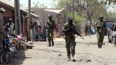 Nigerian troops patrolling in the streets