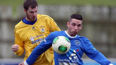 Match action from Ballinamallard United against Dungannon Swifts