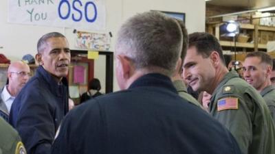 President Barack Obama greets responders recovery workers and community members at the Oso Fire Department in Oso, Wash.,