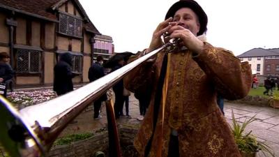 Bugler in front of William Shakespeare's birthplace