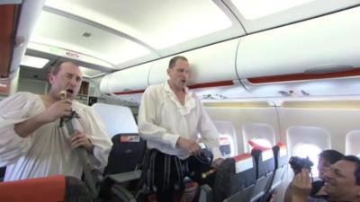 Actors performing on plane