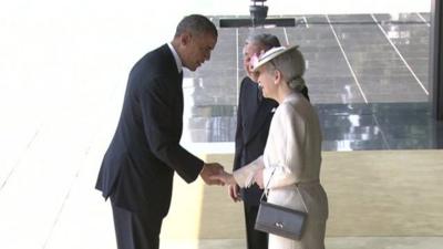 U.S. President Barack Obama (L) is welcomed by Japan"s Emperor Akihito and Emperss Michiko (R) upon his arrival at the Imperial Palace