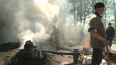 Checkpoints burn in Sloviansk