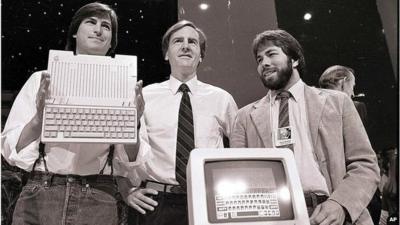 Former Apple CEO John Sculley (centre) with Steve Jobs (left) and Steve Wozniak (right)
