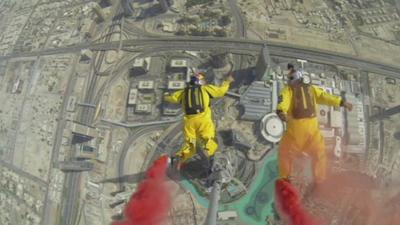 Sky divers jumping from the Burj Kahlifa.