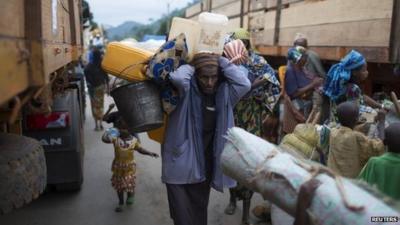 A Muslim man in Bangui prepares to be evacuated by road