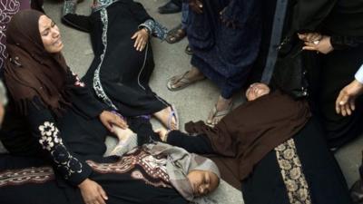 Collapsed relatives outside Egypt court