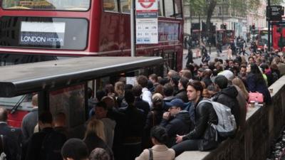 Commuters queue to get on replacement buses