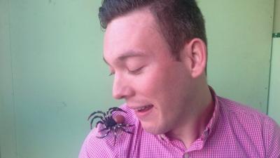 Martin Dougan with a plastic spider on his shoulder