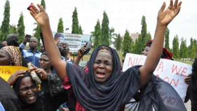 An unidentified mother cries out during a demonstration with others who have daughters among the kidnapped school girls of government secondary school Chibok, Tuesday April 29, 2014