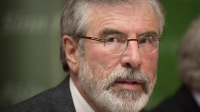 Sinn Fein President Gerry Adams arrives at a news conference after he was released from police detention, in Belfast May 4, 2014