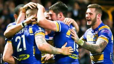 Leeds Rhinos players celebrate a Liam Sutcliffe try