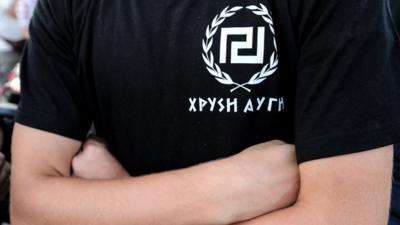 A supporter of extreme-right ultra nationalist party Golden Dawn