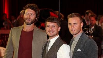 Take That members (L-R) Howard Donald, Mark Owen and Gary Barlow