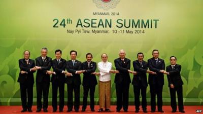 Leaders join hands for photo at ASEAN summit