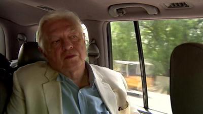 John Simpson in car