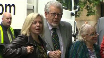 Rolf Harris arrives at Southwark Crown Court with his wife and daughter