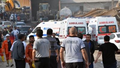 Ambulances at mine where workers in Turkey are trapped