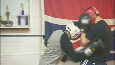 Two men boxing