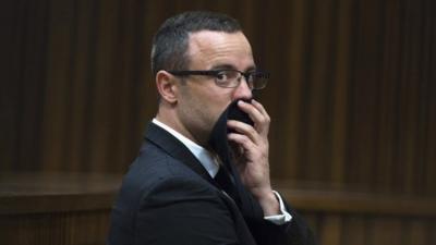 Oscar Pistorius looks on during his trial at the North Gauteng High Court in Pretoria, May 13, 2014