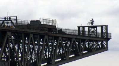 Danny MacAskill on top of a crane