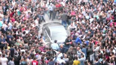 PM Erdogan's car mobbed by protesters