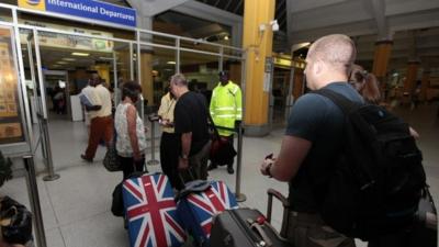 British tourists queue at the departure gate in Kenya