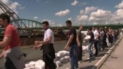 Volunteers on banks of River Sava