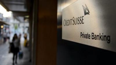 A sign of a Credit Suisse private banking branch is seen on May 19, 2014 in Geneva, Switzerland