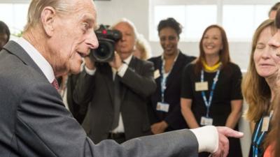 Prince Philip with bandage on hand