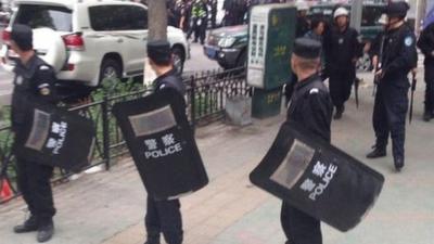 Police at scene of attack in Urumqi - 22 May