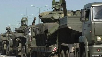 Russian TV aired video it said showed military vehicles pulling back from the Ukrainian border