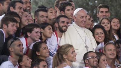Pope Francis poses for a photo after a meeting youths in downtown Cagliari, Italy, 22 September 2013