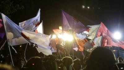 Syriza supporters waving flags
