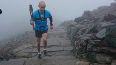 Eryri Harriers with the Queen's Baton on Snowdon