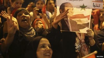 Sisi supporters celebrate in Tahrir Square