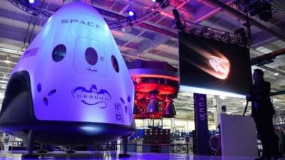 SpaceX CEO Elon Musk unveils Spaces new seven-seat Dragon V2 spacecraft, at a press conference in Hawthorne, California