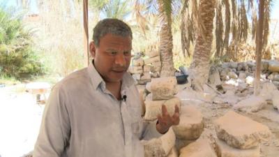 Craftsman Mohammed Eissa works with salt blocks