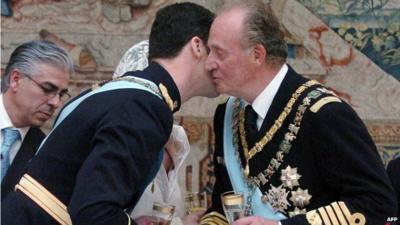 Spanish Crown Prince Felipe of Bourbon receiving a kiss from his father Juan Carlos of Spain