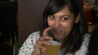 Girl drinking beer in Bangalore