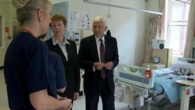 Peter Higson talking to hospital staff