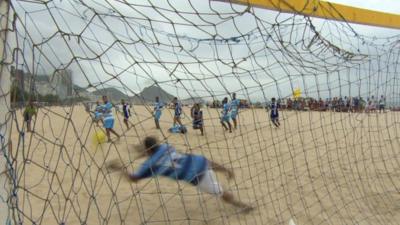 Brazilian's playing football on the beach ahead of the World Cup