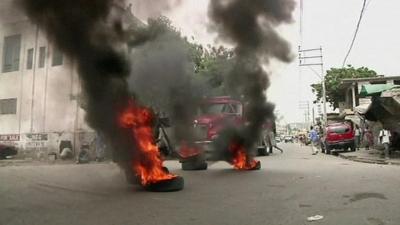 Burning tires on a road in Port-au-Prince