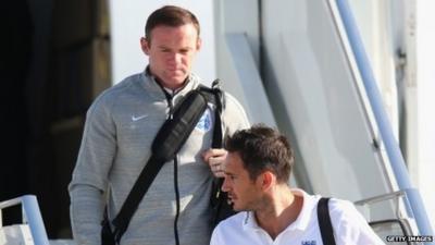 Wayne Rooney and Frank Lampard disembark plane