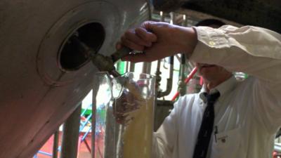 Man pouring a beer