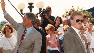 President Bill Clinton and Secret Service Agent Dan Emmett in a crowd in Georgetown, 1993